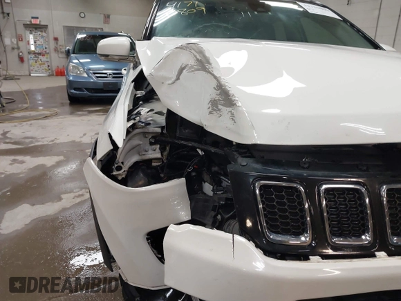 2021 Jeep Compass Limited with VIN 3C4NJCCB0MT576990, listed as a IAAI auction lot 41710809 with 77,903 mi miles. Bid and sale history available at carsss.com. Image 17.