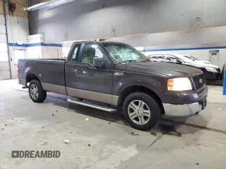 2005 Ford F-150 XL with VIN 1FTRF12W15KC15606, listed as a Copart auction lot 45539145 with 102,208 mi miles and Salvage Title. Bid and sale history available at carsss.com. Image 4.
