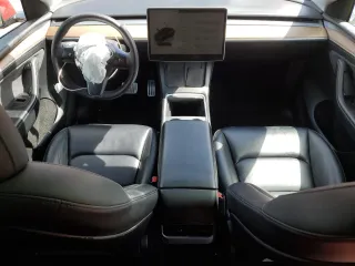 2023 Tesla Model Y Performance z VIN 7SAYGDEF2PF591238, wystawiony jako Copart lot #51991025 z przebiegiem 44 749 mil mil oraz Szkoda całkowita • Salvage title. Historia ofert i sprzedaży dostępna na DreamBid. Obrazek 8.