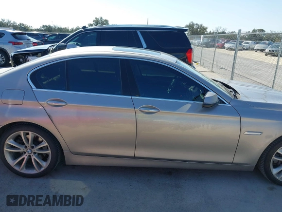 2015 BMW 5 Series 535i with VIN WBA5B1C56FG125286, listed as a IAAI auction lot 41747088 with 136,970 mi miles and . Bid and sale history available at carsss.com. Image 13.