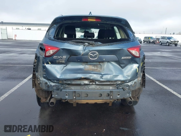 2015 Mazda CX-5 Sport with VIN JM3KE4BY0F0507727, listed as a IAAI auction lot 41249151 with 95,343 mi miles. Bid and sale history available at carsss.com. Image 17.