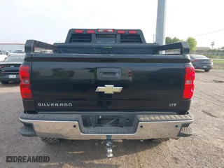 2014 Chevrolet Silverado 1500 LTZ with VIN 3GCUKSECXEG229900, listed as a IAAI auction lot 41962785 with 156,984 mi miles. Bid and sale history available at carsss.com. Image 16.