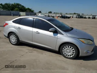 2012 Ford Focus SE z VIN 1FAHP3F23CL174243, wystawiony jako Copart lot #52247595 z przebiegiem 164 383 mil mil oraz Czysty tytuł • Clean title. Historia ofert i sprzedaży dostępna na DreamBid. Obrazek 4.