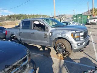 2023 Ford F-150 XL with VIN 1FTFW1E55PKD57059, listed as a IAAI auction lot 41625898 with 49,882 mi miles. Bid and sale history available at carsss.com. Image 13.