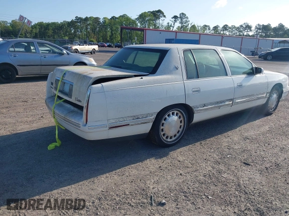 1999 Cadillac DeVille z VIN 1G6KD54Y7XU720668, wystawiony jako IAAI lot #42147461 z przebiegiem 92 054 mil mil oraz . Historia ofert i sprzedaży dostępna na DreamBid. Obrazek 4.