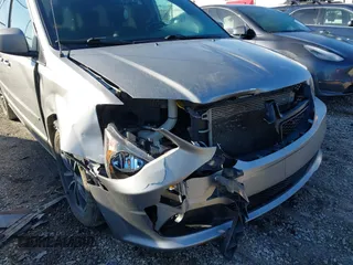 2016 Dodge Grand Caravan SE with VIN 2C4RDGBGXGR217926, listed as a IAAI auction lot 41631102 with 89,027 mi miles and . Bid and sale history available at DreamBid. Image 6.