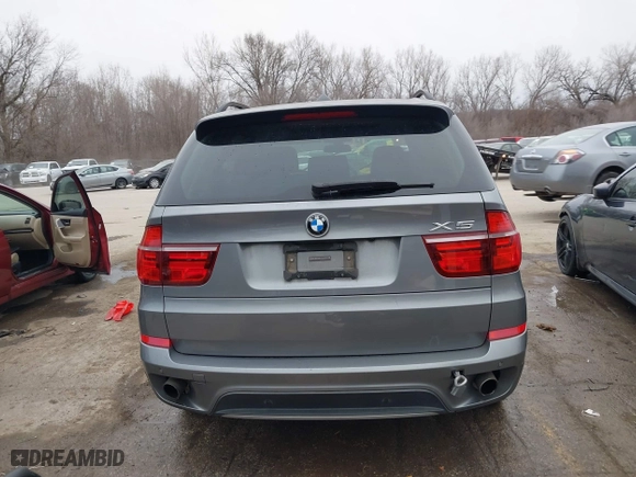2011 BMW X5 35i with VIN 5UXZV4C52BL407776, listed as a IAAI auction lot 41538832 with 108,546 mi miles. Bid and sale history available at carsss.com. Image 16.