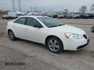 2005 Pontiac G6 GT with VIN 1G2ZH548554124234, listed as a IAAI auction lot 42053402 with 124,699 mi miles. Bid and sale history available at carsss.com. Image 1.
