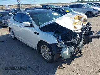 2015 Kia Optima EX with VIN 5XXGN4A73FG377402, listed as a IAAI auction lot 41209243 with 217,948 mi miles. Bid and sale history available at carsss.com. Image 1.