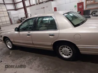 1997 Mercury Grand Marquis LS with VIN 2MELM75W2VX692003, listed as a IAAI auction lot 41547614 with 148,499 mi miles and . Bid and sale history available at DreamBid. Image 14.