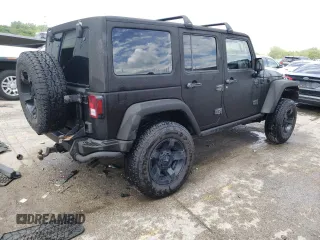 2013 Jeep Wrangler Unlimited Rubicon 10th Anniversary with VIN 1C4HJWFGXDL543660, listed as a Copart auction lot 61462104 with 115,897 mi miles and Salvage title. Bid and sale history available at DreamBid. Image 3.