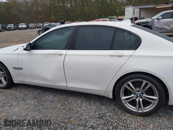 2014 BMW 7 Series 740i with VIN WBAYA6C51ED144387, listed as a IAAI auction lot 41226638 with 161,448 mi miles. Bid and sale history available at carsss.com. Image 14.