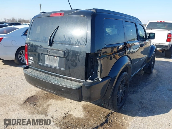 2007 Dodge Nitro SLT with VIN 1D8GT58K97W666680, listed as a IAAI auction lot 41573904 with 171,795 mi miles. Bid and sale history available at carsss.com. Image 4.