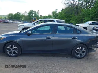 2019 Kia Forte LXS z VIN 3KPF24AD5KE099888, wystawiony jako IAAI lot #42279249 z przebiegiem 90 095 mil mil oraz . Historia ofert i sprzedaży dostępna na DreamBid. Obrazek 14.