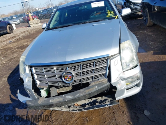 2010 Cadillac STS AWD with VIN 1G6DU6EV8A0120484, listed as a IAAI auction lot 41528974 with 89,489 mi miles and . Bid and sale history available at carsss.com. Image 12.