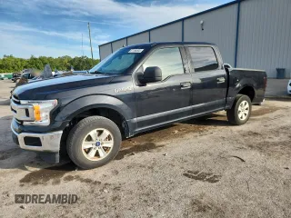 2019 Ford F-150 XL with VIN 1FTEW1CB6KFB18660, listed as a Copart auction lot 61156835 with 90,084 mi miles and Salvage title. Bid and sale history available at DreamBid. Image 1.