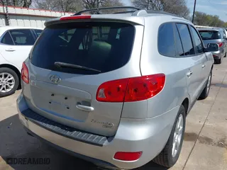2009 Hyundai Santa Fe SE with VIN 5NMSH13E99H300552, listed as a IAAI auction lot 41772584 with 155,127 mi miles. Bid and sale history available at carsss.com. Image 4.
