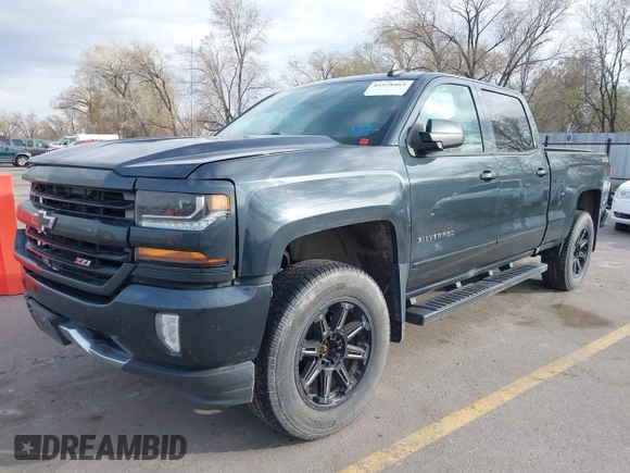 2017 Chevrolet Silverado 1500 LT with VIN 3GCUKREC7HG220780, listed as a IAAI auction lot 41978463 with 131,532 mi miles and . Bid and sale history available at DreamBid. Image 2.