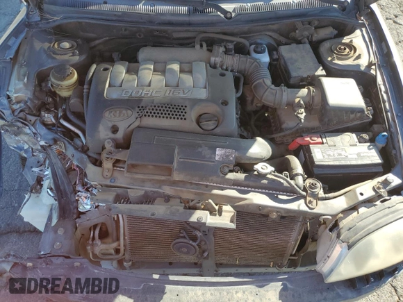2003 Kia Spectra z VIN KNAFB121335277388, wystawiony jako Copart lot #46756185 z przebiegiem 151 235 mil mil oraz Szkoda całkowita • Salvage title. Historia ofert i sprzedaży dostępna na DreamBid. Obrazek 13.