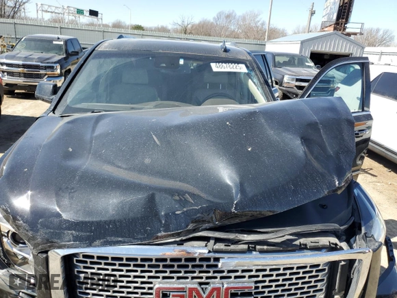 2017 GMC Yukon Denali with VIN 1GKS2CKJXHR389946, listed as a Copart auction lot 48678225 with 156,603 mi miles and Salvage Title. Bid and sale history available at carsss.com. Image 14.