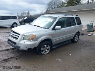 2006 Honda Pilot EX with VIN 2HKYF18426H553632, listed as a IAAI auction lot 41656610 with 154,470 mi miles. Bid and sale history available at carsss.com. Image 2.