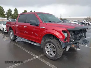 2015 Ford F-150 XLT with VIN 1FTEW1E89FFB76849, listed as a IAAI auction lot 41936016 with 107,773 mi miles and . Bid and sale history available at carsss.com. Image 1.