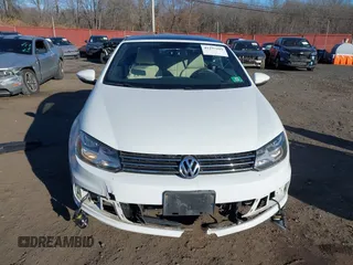 2015 Volkswagen Eos Komfort with VIN WVWBW8AH0FV001011, listed as a IAAI auction lot 41297299 with 81,444 mi miles and . Bid and sale history available at DreamBid. Image 12.