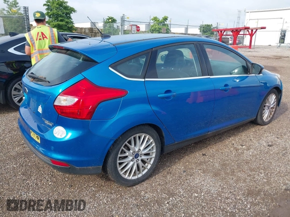 2014 Ford Focus Titanium with VIN 1FADP3N28EL119791, listed as a IAAI auction lot 42712044 with 144,338 mi miles and . Bid and sale history available at DreamBid. Image 4.