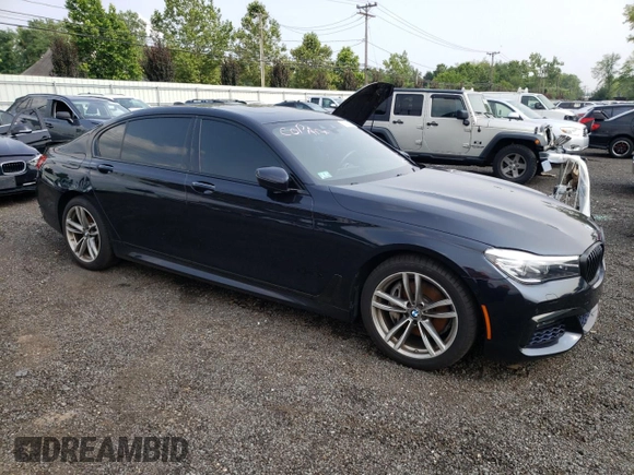 2018 BMW 7 Series 740e xDrive with VIN WBA7J2C57JG938291, listed as a Copart auction lot 58337763 with 53,259 mi miles and . Bid and sale history available at DreamBid. Image 4.