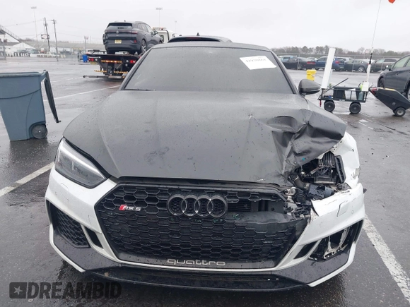 2018 Audi RS 5 z VIN WUAPWAF5XJA905043, wystawiony jako IAAI lot #41978868 z przebiegiem 60 838 mil mil oraz . Historia ofert i sprzedaży dostępna na DreamBid. Obrazek 12.