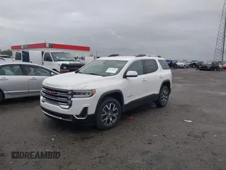 2023 GMC Acadia SLT with VIN 1GKKNML43PZ187213, listed as a IAAI auction lot 41776856 with 45,319 mi miles and . Bid and sale history available at DreamBid. Image 2.