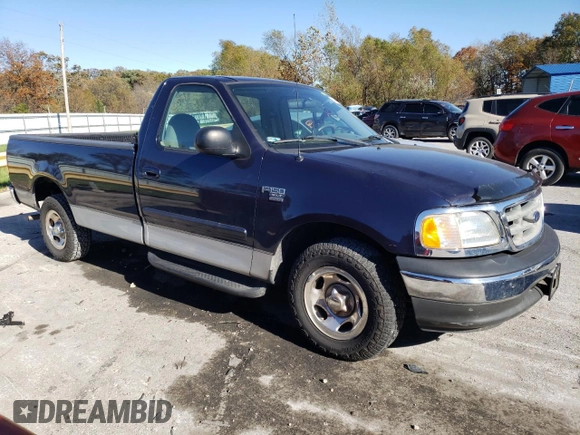 2003 Ford F-150 XL with VIN 1FTRF17L03NB45767, listed as a Copart auction lot 74489053 with 138,263 mi miles and Salvage Title. Bid and sale history available at DreamBid. Image 4.