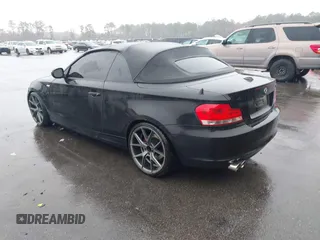 2012 BMW 1 Series 128i with VIN WBAUN1C51CVH84311, listed as a IAAI auction lot 41551912 with 147,052 mi miles and . Bid and sale history available at DreamBid. Image 3.