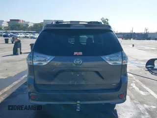 2012 Toyota Sienna SE with VIN 5TDXK3DCXCS233593, listed as a IAAI auction lot 41959611 with 85,558 mi miles. Bid and sale history available at carsss.com. Image 17.