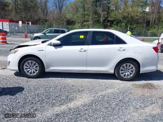 2012 Toyota Camry Hybrid XLE with VIN 4T1BD1FK9CU030618, listed as a IAAI auction lot 41989253 with 230,878 mi miles. Bid and sale history available at carsss.com. Image 14.