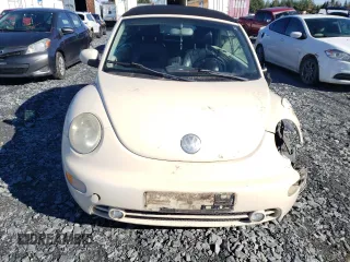 2005 Volkswagen Beetle with VIN 3VWCM21Y15M311018, listed as a Copart auction lot 77611914 with 187,498 mi miles and Salvage Title. Bid and sale history available at DreamBid. Image 5.