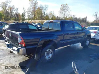 2013 Toyota Tacoma with VIN 3TMMU4FN4DM052928, listed as a IAAI auction lot 40846879 with 113,928 mi miles. Bid and sale history available at carsss.com. Image 4.