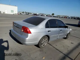 2001 Honda Civic LX with VIN 2HGES16551H562161, listed as a Copart auction lot 71089984 with 0 mi miles and Salvage Title. Bid and sale history available at carsss.com. Image 3.
