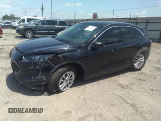 2020 Ford Escape SE with VIN 1FMCU0G61LUB77189, listed as a IAAI auction lot 42223410 with 101,407 mi miles and . Bid and sale history available at DreamBid. Image 2.