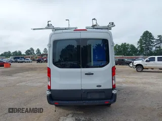 2015 Ford Transit Cargo with VIN 1FTNR1CM2FKB29029, listed as a IAAI auction lot 42286089 with 130,845 mi miles and . Bid and sale history available at DreamBid. Image 16.