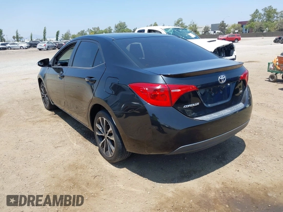 2017 Toyota Corolla L with VIN 5YFBURHE1HP712536, listed as a IAAI auction lot 42592613 with 76,672 mi miles and . Bid and sale history available at DreamBid. Image 3.