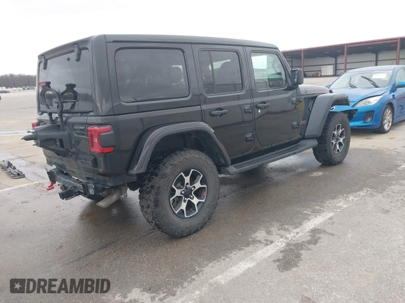 2021 Jeep Wrangler Unlimited Rubicon with VIN 1C4HJXFG8MW775419, listed as a IAAI auction lot 41797178 with 56,166 mi miles. Bid and sale history available at carsss.com. Image 4.
