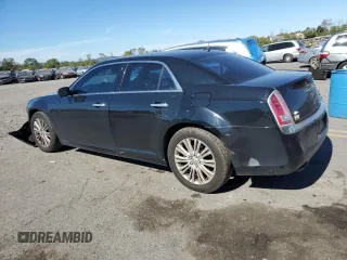 2013 Chrysler 300 C with VIN 2C3CCAKG0DH683117, listed as a Copart auction lot 74812334 with 187,308 mi miles and Salvage Title. Bid and sale history available at DreamBid. Image 2.