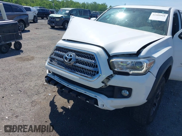 2016 Toyota Tacoma SR with VIN 3TMCZ5AN0GM003224, listed as a IAAI auction lot 42289910 with 140,899 mi miles and . Bid and sale history available at DreamBid. Image 6.