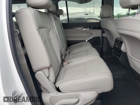 2023 Jeep Wagoneer Series II with VIN 1C4SJVBP0PS546311, listed as a Copart auction lot 55163665 with 23,576 mi miles and Salvage title. Bid and sale history available at DreamBid. Image 11.