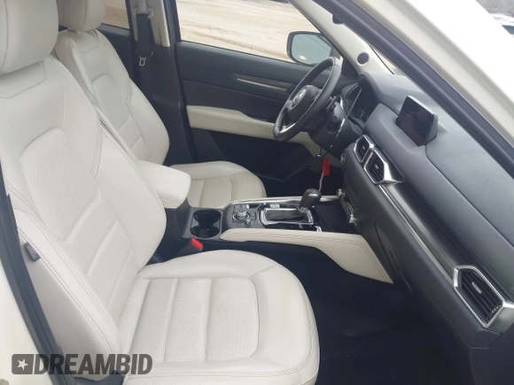 2020 Mazda CX-5 Grand Touring with VIN JM3KFBDM5L0731373, listed as a IAAI auction lot 41900567 with 31,268 mi miles and . Bid and sale history available at DreamBid. Image 5.