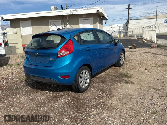 2013 Ford Fiesta SE with VIN 3FADP4EJ0DM141097, listed as a Copart auction lot 51342175 with 146,316 mi miles and Clean Title. Bid and sale history available at carsss.com. Image 4.