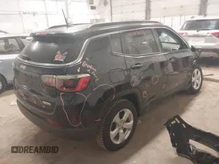 2020 Jeep Compass Latitude with VIN 3C4NJDBB7LT157086, listed as a IAAI auction lot 41263623 with 103,783 mi miles and . Bid and sale history available at DreamBid. Image 4.