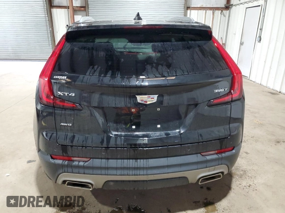2021 Cadillac XT4 AWD Premium Luxury z VIN 1GYFZDR41MF001099, wystawiony jako Copart lot #48744655 z przebiegiem 57 633 mil mil oraz Czysty tytuł • Clean title. Historia ofert i sprzedaży dostępna na DreamBid. Obrazek 6.