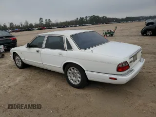 1998 Jaguar XJ with VIN SAJHX1248WC835728, listed as a Copart auction lot 86698244 with 116,768 mi miles and Clean title. Bid and sale history available at DreamBid. Image 2.